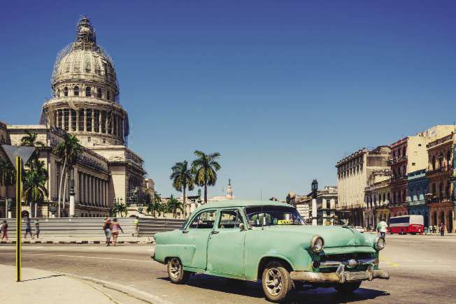 Old_Green_American_car_on_Havana_street_-_iStock_64822809_opt.jpg